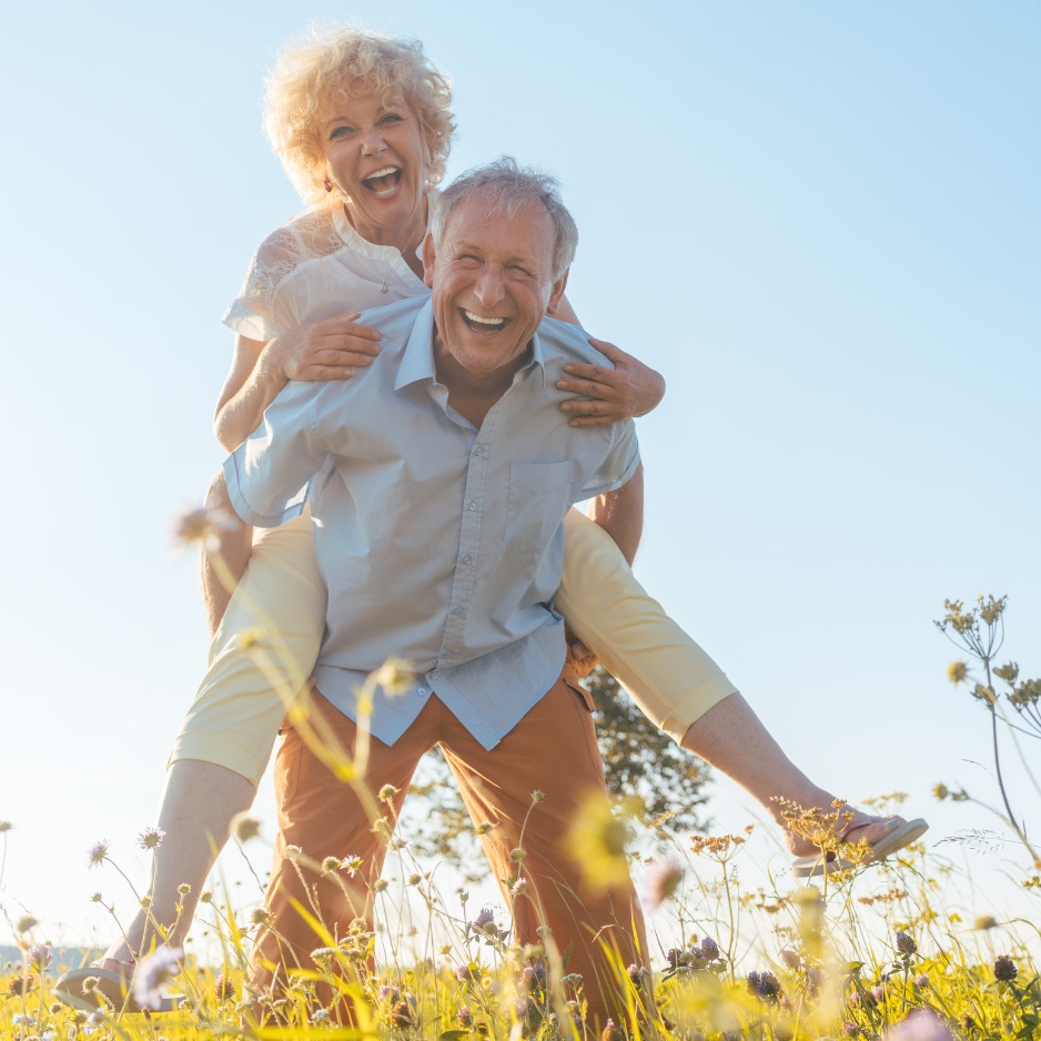 Happy healthy seniors enjoying life outdoors